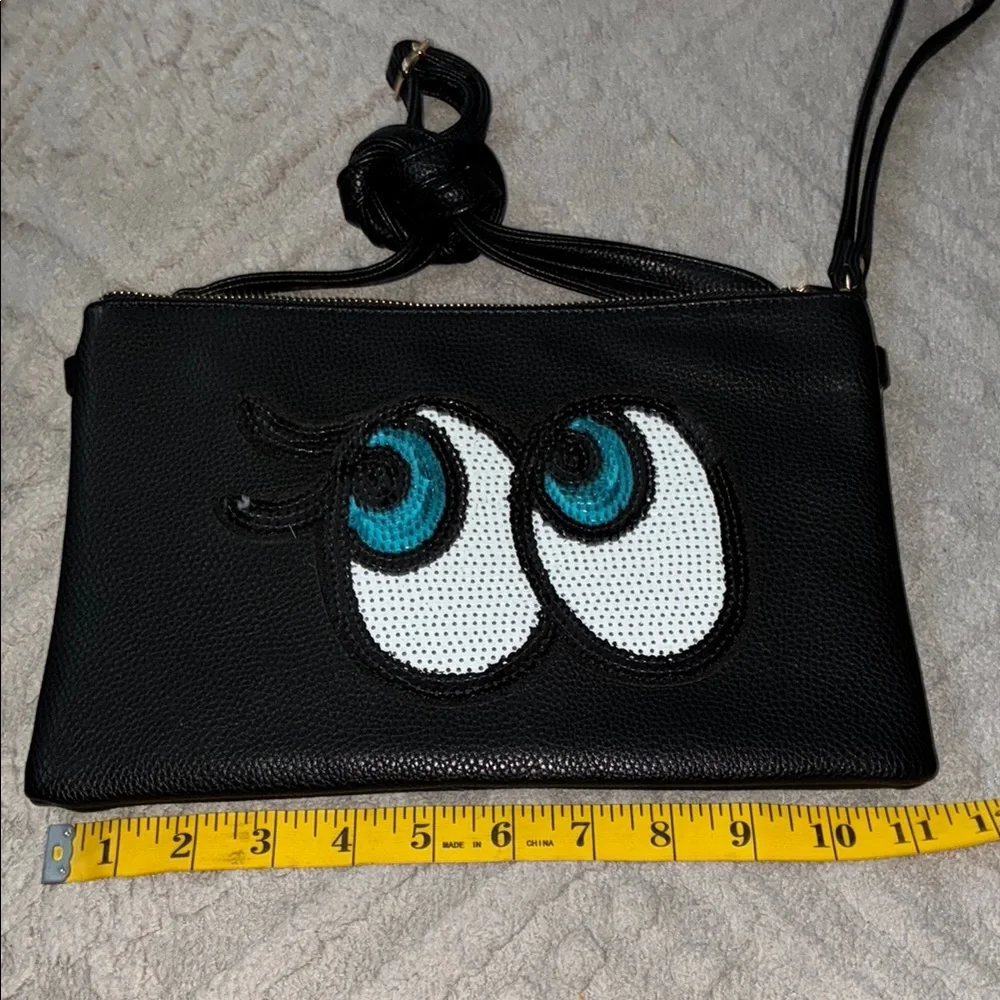 NWOT Black Leather Clutch with Eye Design